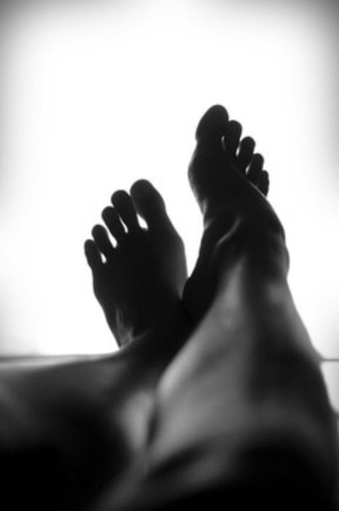 Black and white person feets pedicure medium
